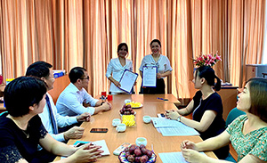 Cooperation signing ceremony between Siglaw and CLEF Institute